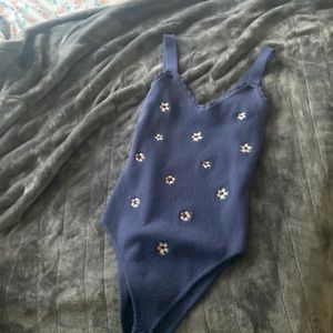 Large bodysuit. Blue with floral design